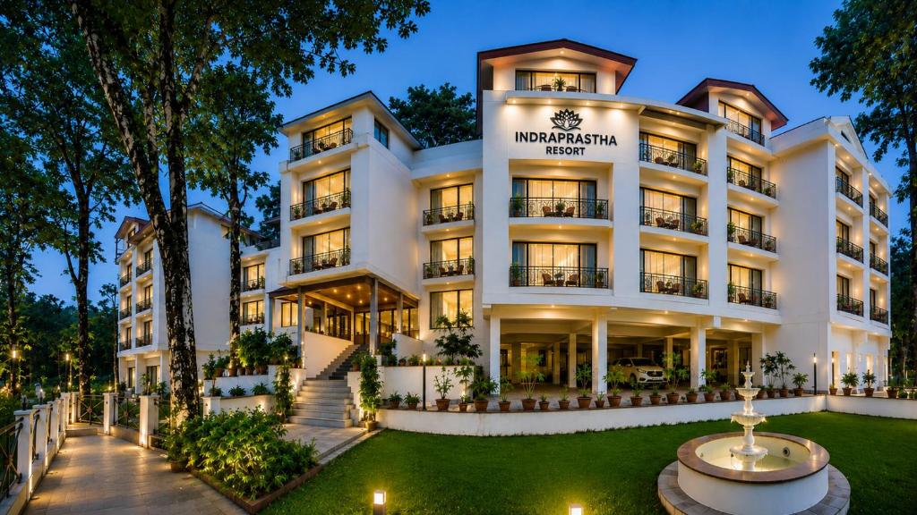 an exterior view of a hotel at night at INDRAPRASTHA RESORT And SPA - DALHOUSIE in Dalhousie