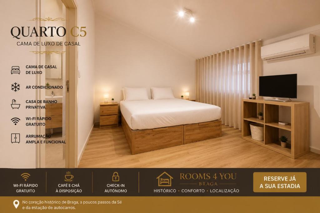 a hotel room with a bed and a tv at Rooms4you 3 in historic center of Braga in Braga