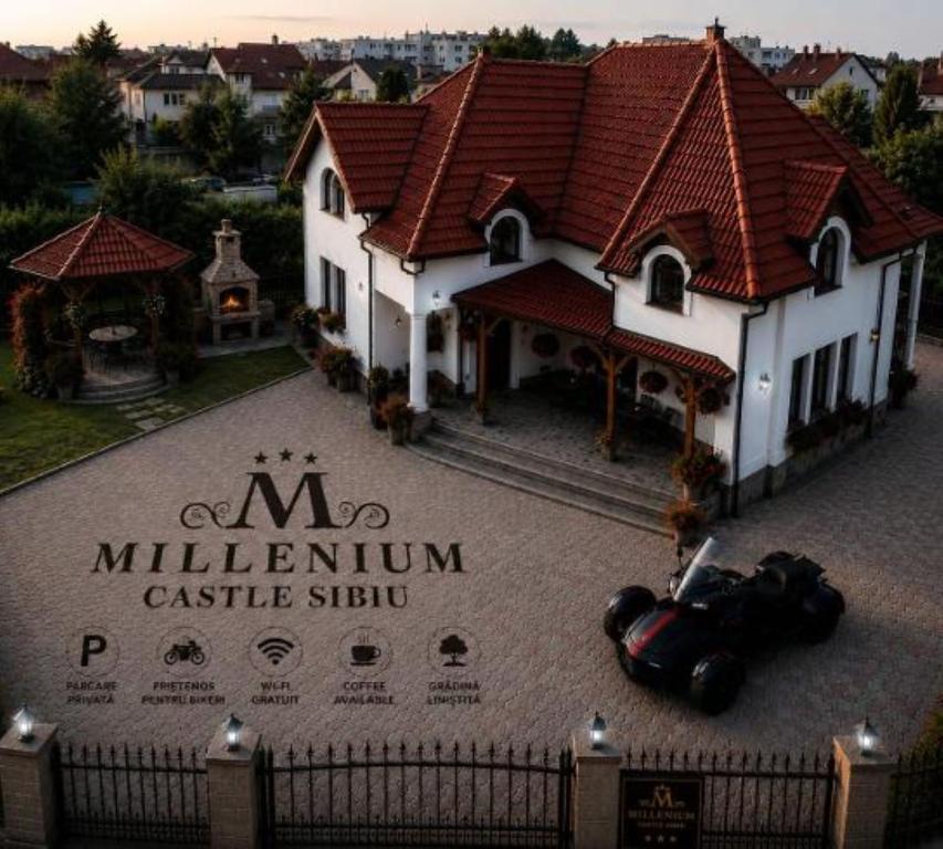 a model of a house with a camera in front of it at Millenium Castle Sibiu - Parking on Site - BIKERS' Haven in the Heart of Romania's Legendary Roads - Rest in Comfort # in Sibiu