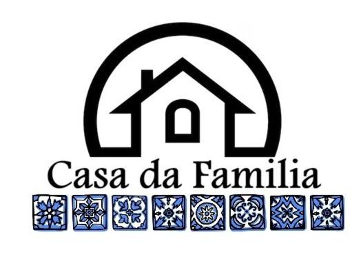 a logo for a house with a tile pattern at Casa D' Familia in Alte