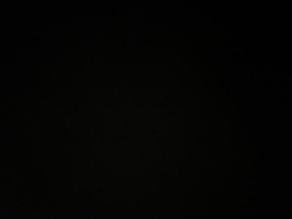 a dark room with a black background at Tolen camp in Disah