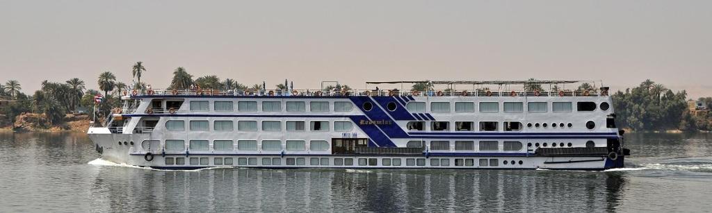 a large cruise ship on the water at Sun Nile Cruise in Aswan