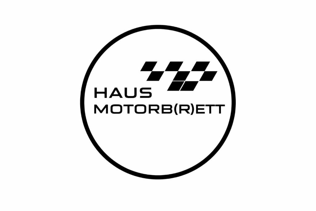 a black and white logo for hos morpheusrett at Haus Motorbrett in Fohnsdorf