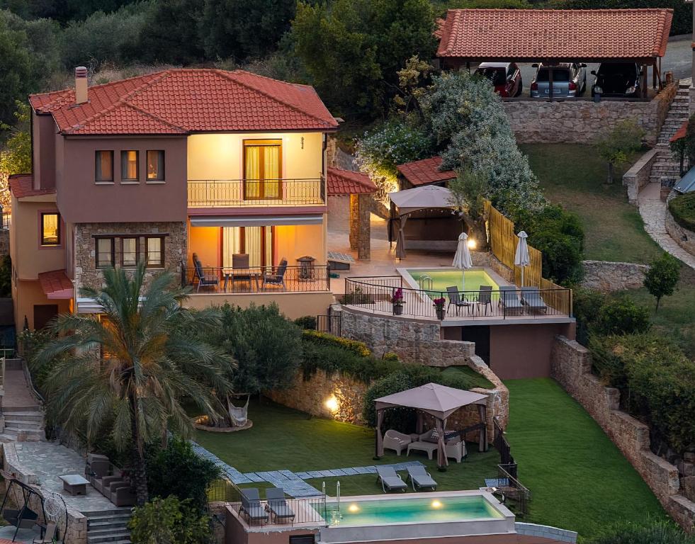 an aerial view of a house with a yard at The Grand Panorama Villa in Nea Moudania