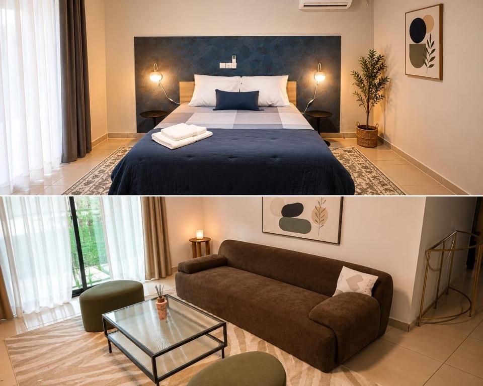 a hotel room with a bed and a couch at Hcp appartement in Abidjan