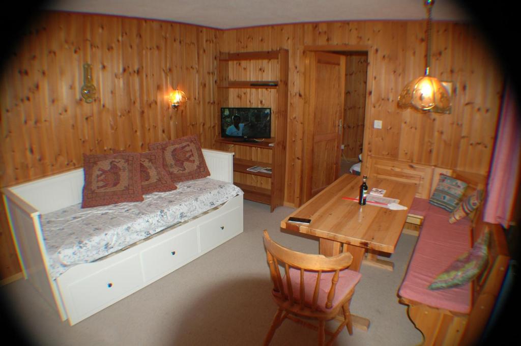 Postel nebo postele na pokoji v ubytování Chalet Valdonga