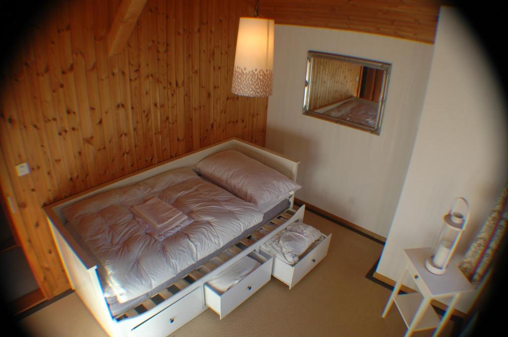 Postel nebo postele na pokoji v ubytování Chalet Valdonga