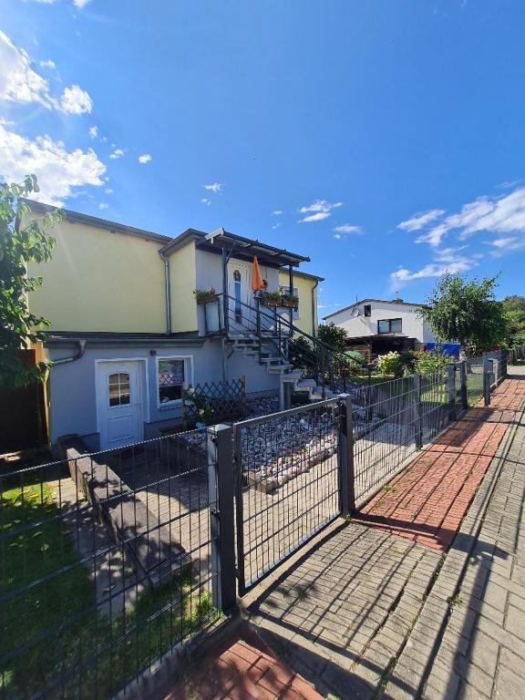 a fence in front of a house at Seestern in Rerik