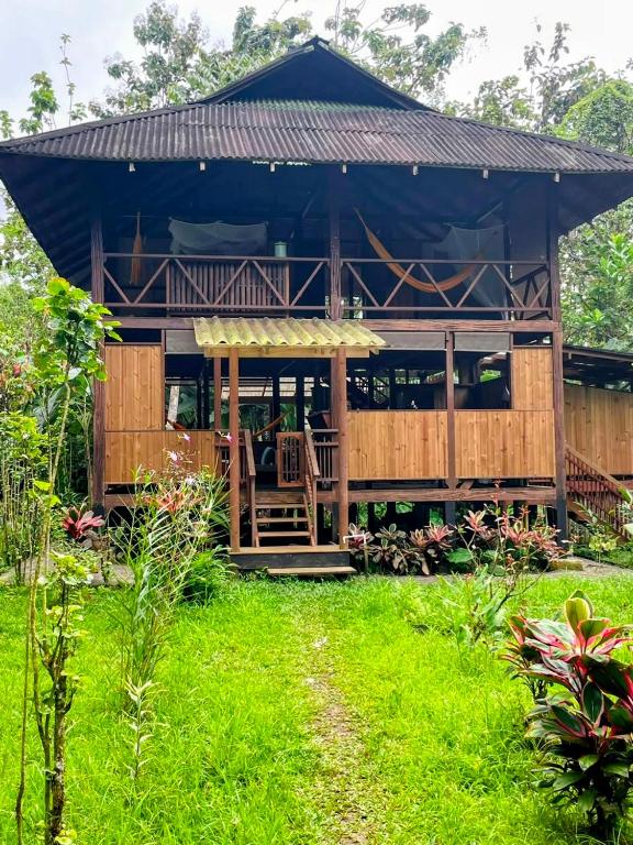 a house in the middle of a garden at Casa Prana Nuquí in Nuquí