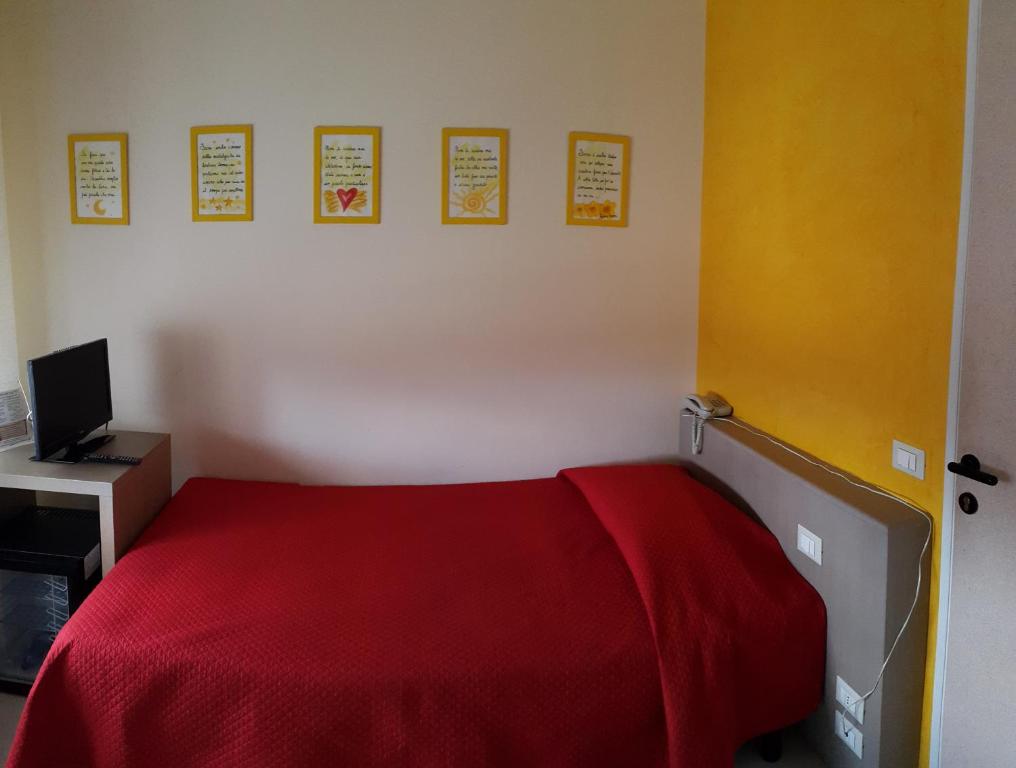 Postel nebo postele na pokoji v ubytování Cavalieri del Tau