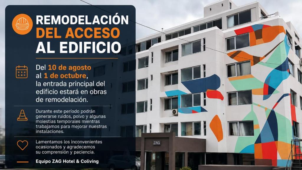 a building with a sign in front of it at ZAG Coliving Punta del este in Punta del Este