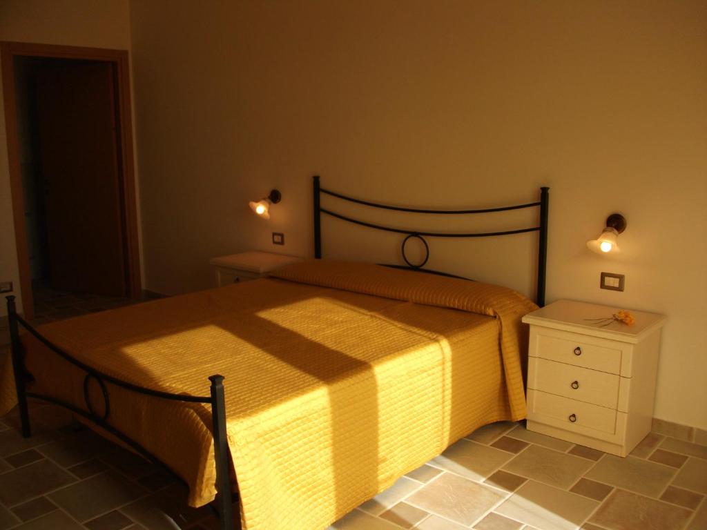 Postel nebo postele na pokoji v ubytování Poggio del Conero