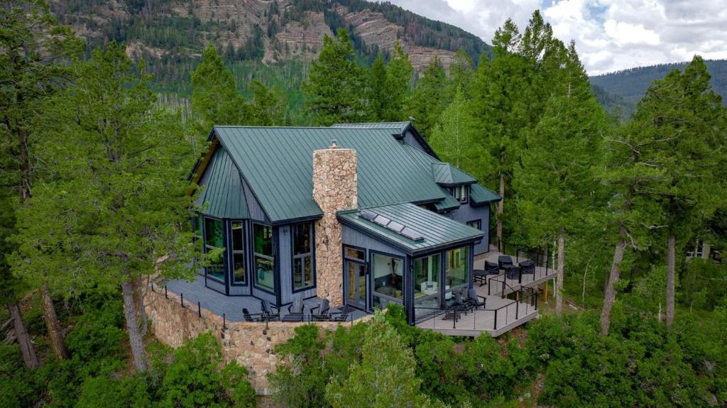 an aerial view of a house in the woods at 83 Ridge Road in Durango