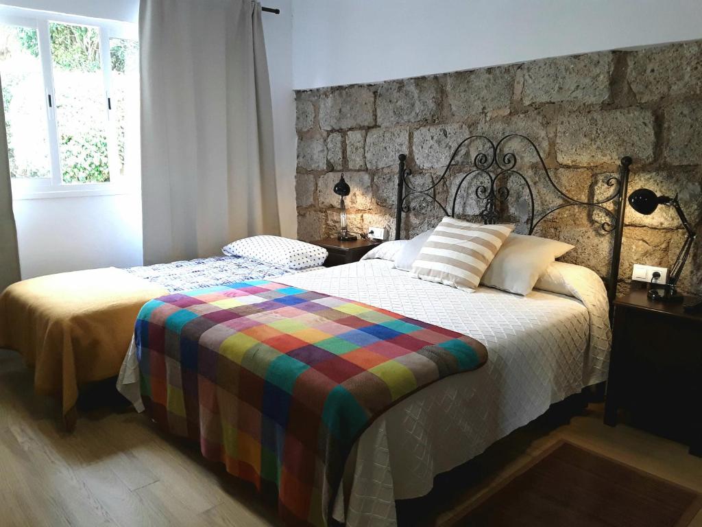 Postel nebo postele na pokoji v ubytování Finca El Trazo
