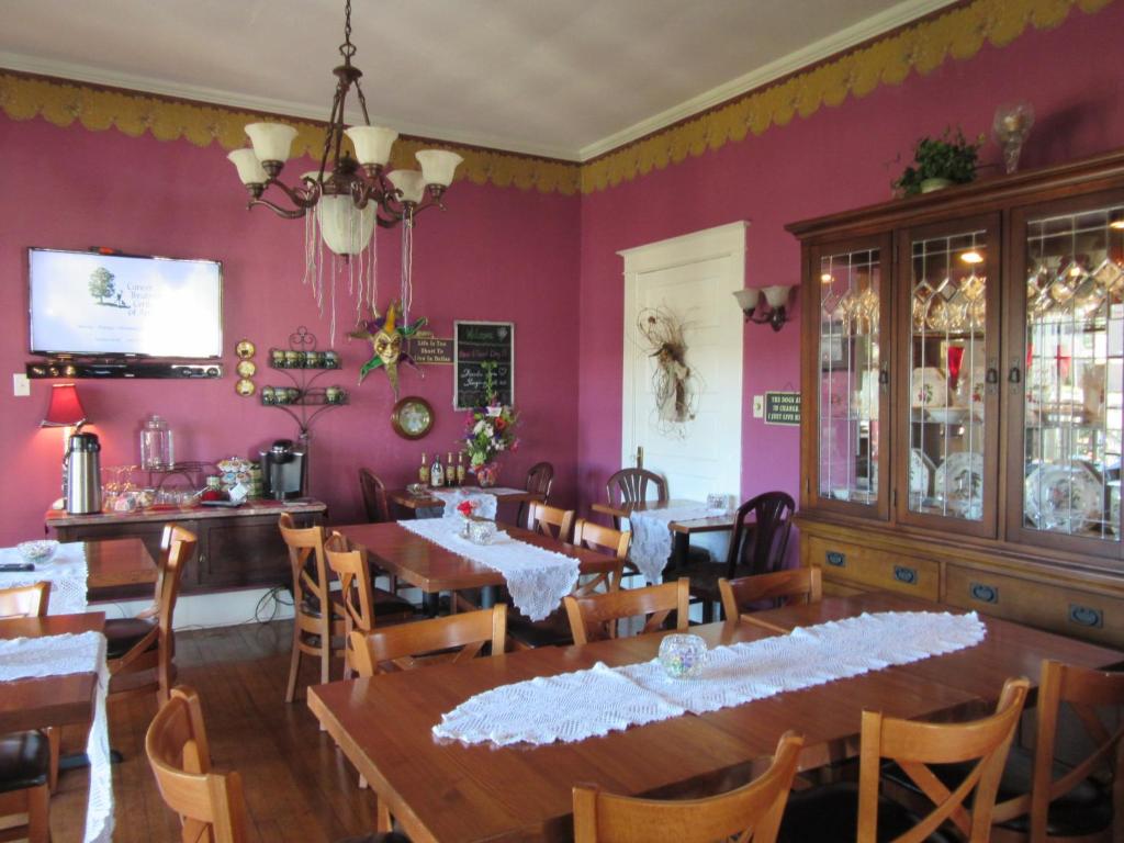 TV a/nebo společenská místnost v ubytování The Carriage House