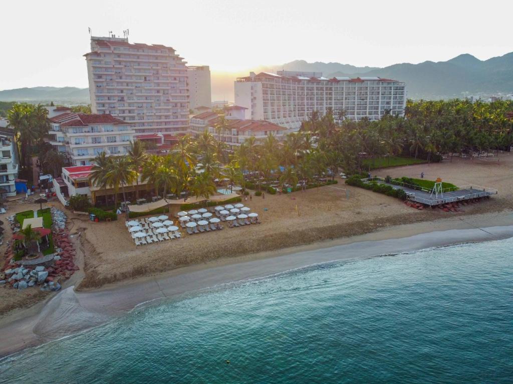 an aerial view of a beach with a resort at Friendly Fun Vallarta Different Experiences - All Inclusive in Puerto Vallarta