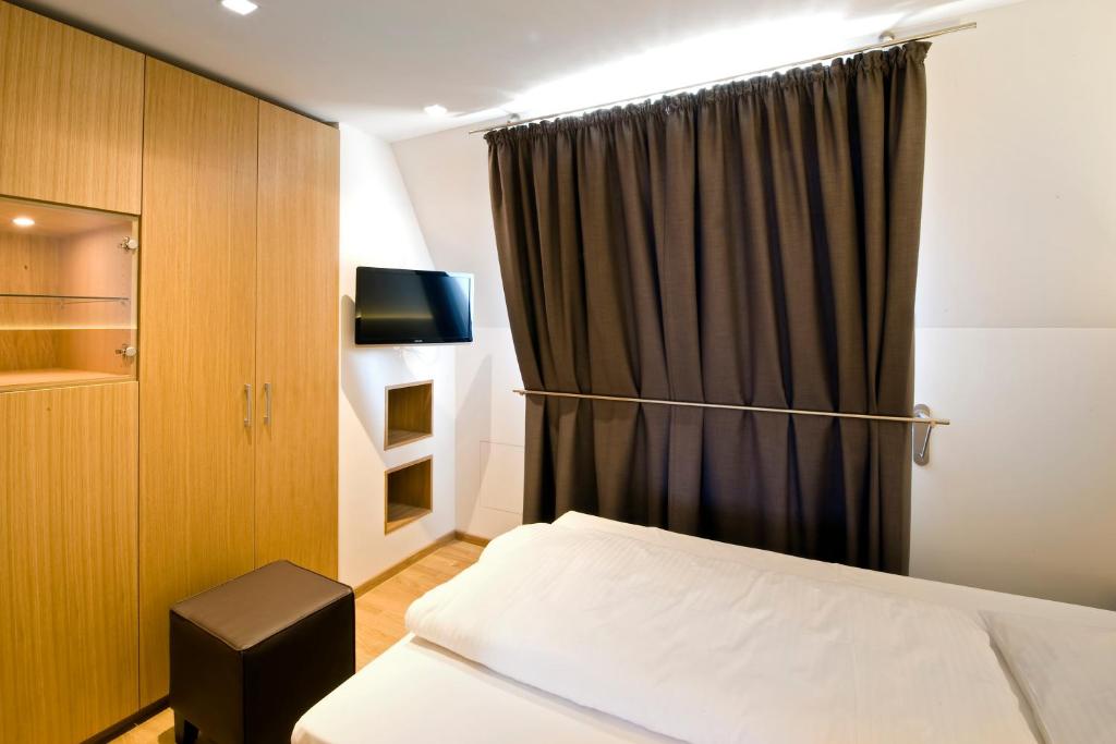 Postel nebo postele na pokoji v ubytování Hotel Thalmair