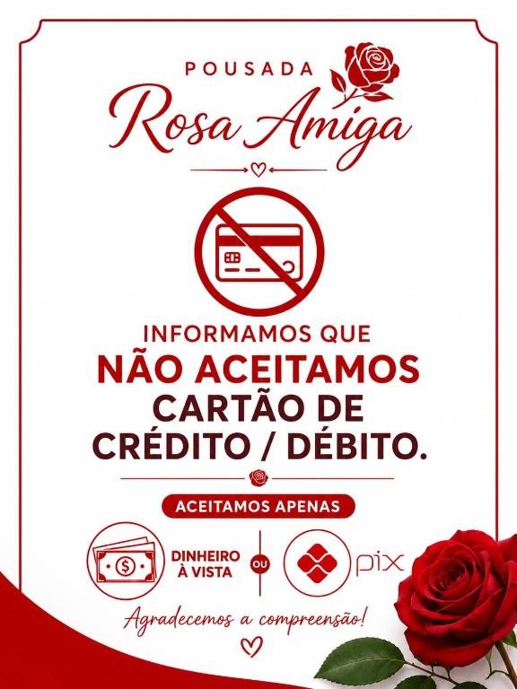 a sign for a restaurant with a red rose at ''Pousada Rosa Amiga'' in Barretos
