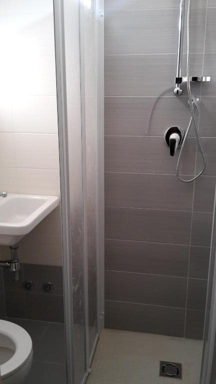 Koupelna v ubytování Hotel Edera