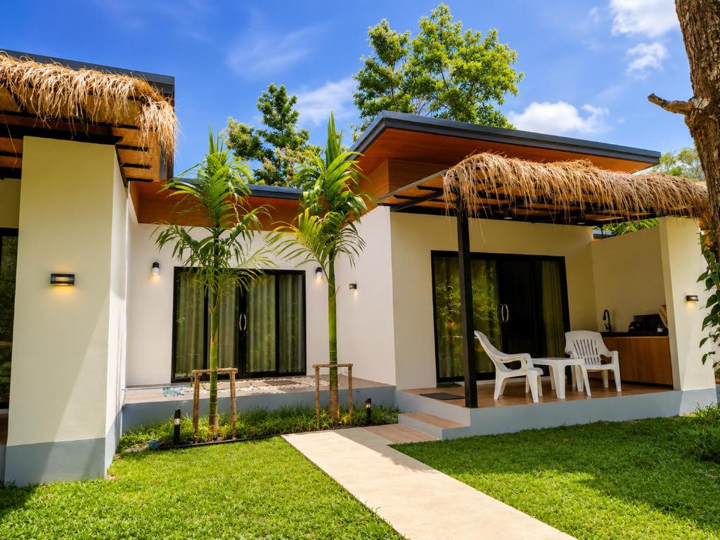 a villa with a view of the yard at Ingtara at Lanta in Ko Lanta
