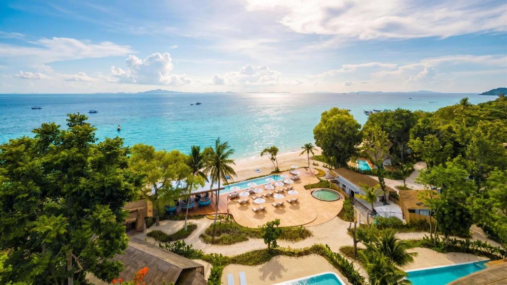 an aerial view of a resort and the ocean at OUTRIGGER Phi Phi Island Resort in Phi Phi Islands
