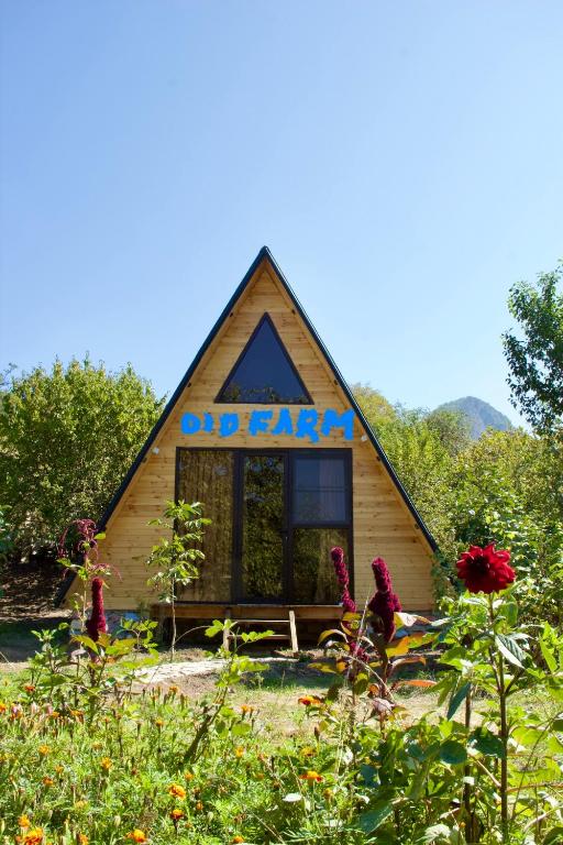 a small house with a sign on the side of it at Old farm 1 in Ijevan