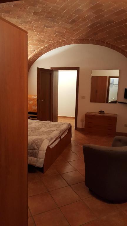 Postel nebo postele na pokoji v ubytování Orto degli Ulivi