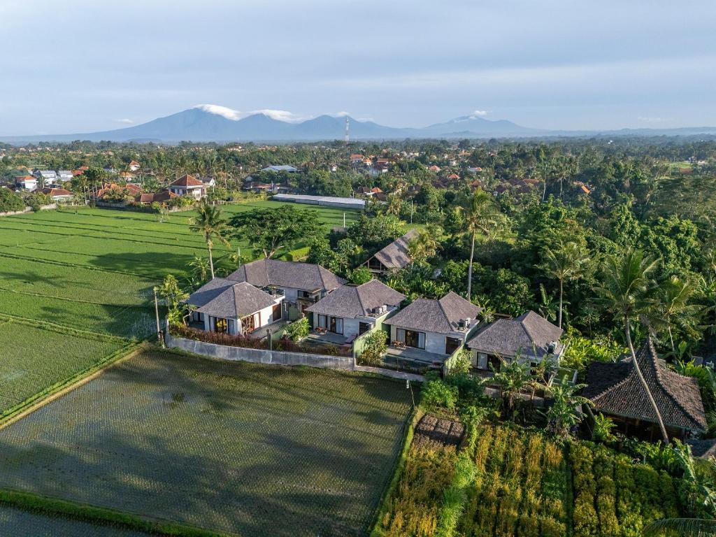 an aerial view of a house with a large yard at Royal Arkara Villas by Arkamara in Ubud