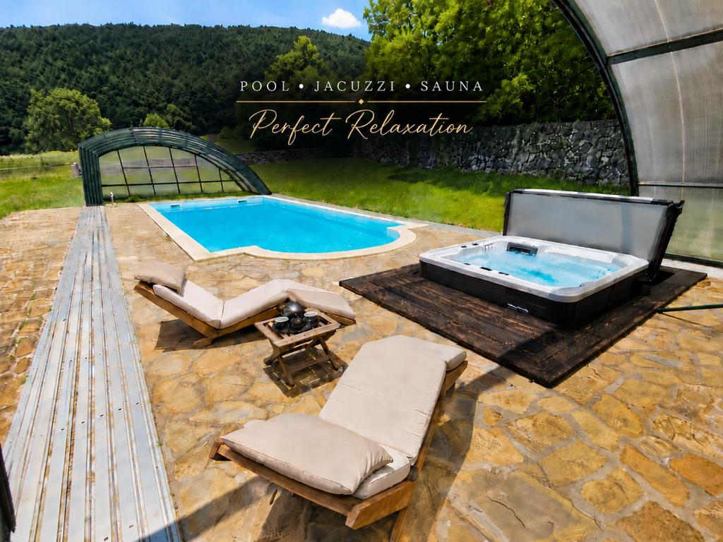 a lap pool with a spa and chairs and a hot tub at Villa Noiram - Your dream Getaway in Nature in Senožeče