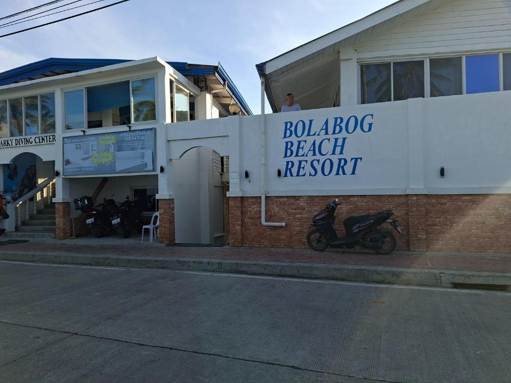 a building with a sign for a beach resort at Bolabog Beach Resort in Boracay