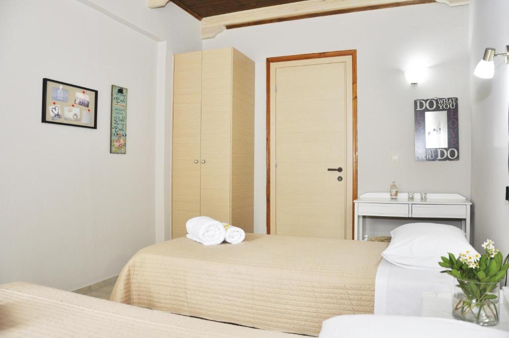 Postel nebo postele na pokoji v ubytování Villa Lakki Heated round pool Jacuzzi