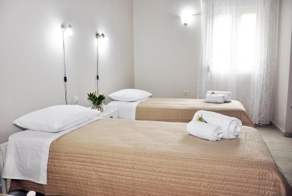 Postel nebo postele na pokoji v ubytování Villa Lakki Heated round pool Jacuzzi