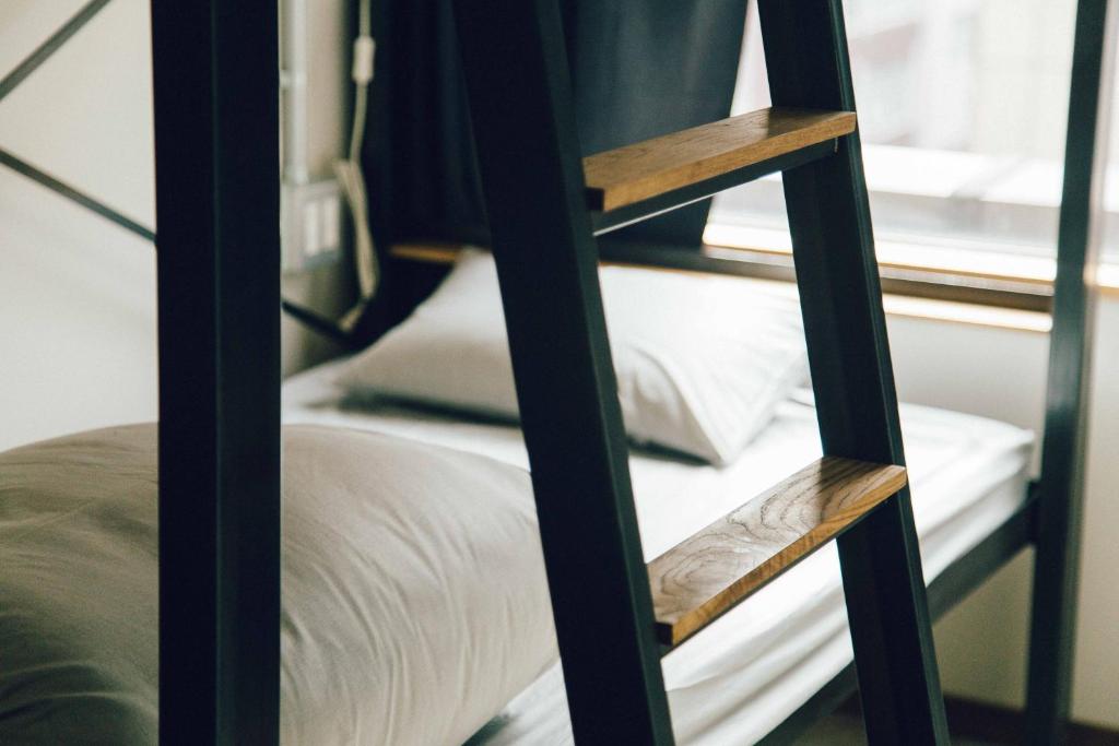 Postel nebo postele na pokoji v ubytování CITAN Hostel