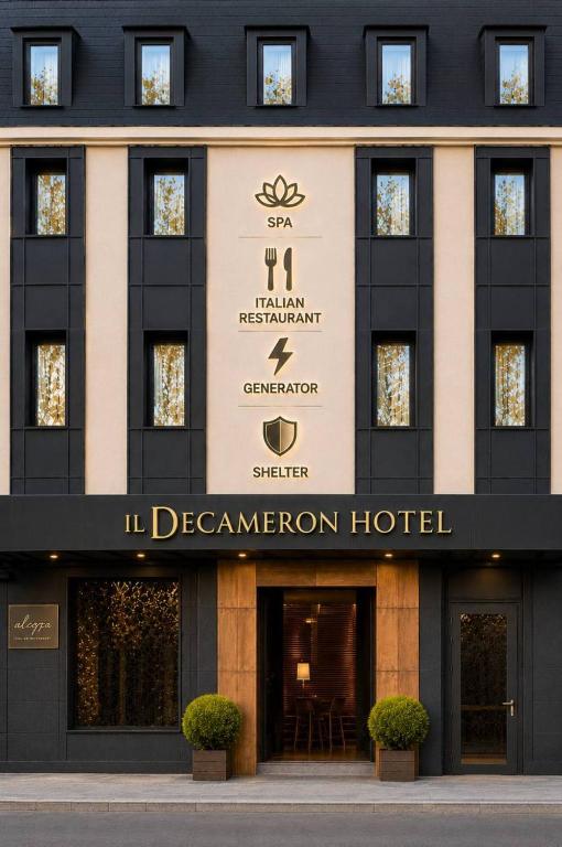 a building with a sign for a hotel at Il Decameron Luxury Design Hotel in Odesa