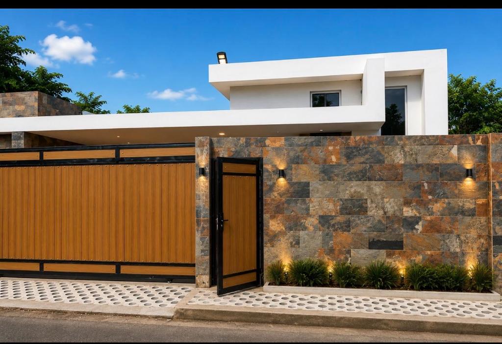 a house with a door in front of it at Villa danexia in Juan Dolio