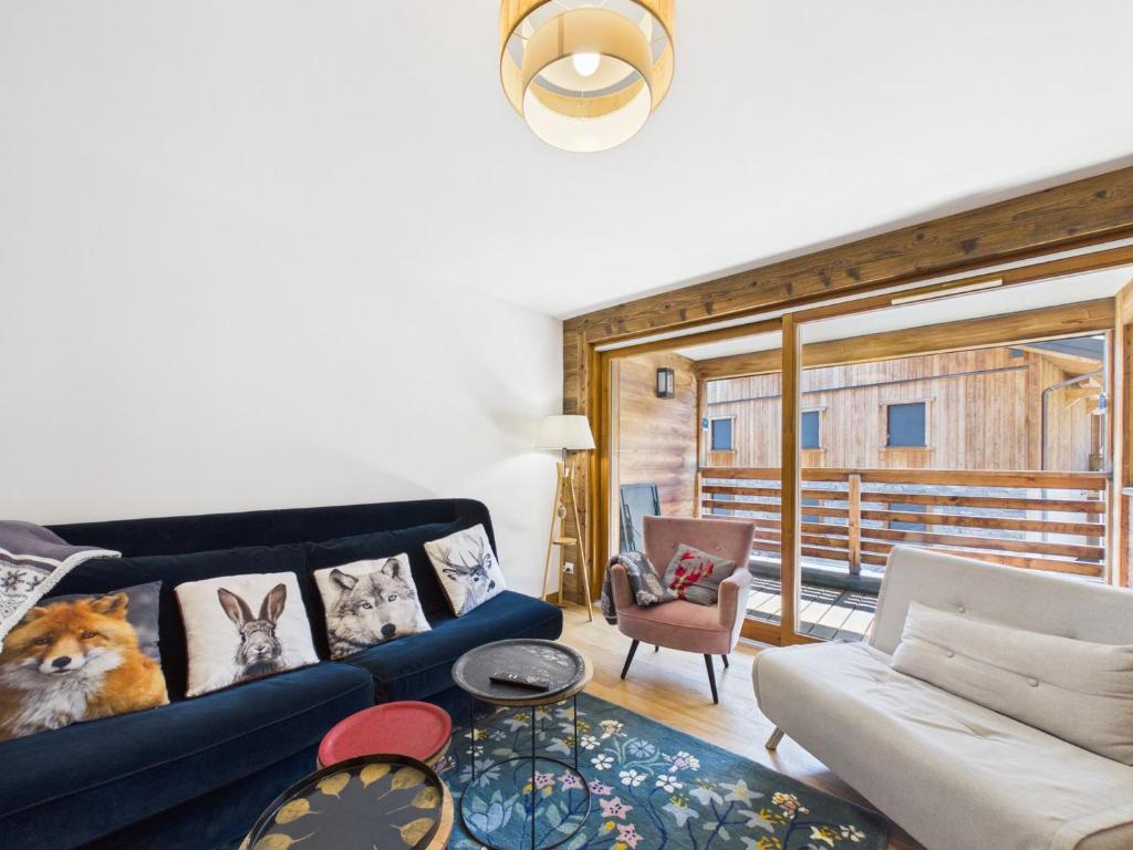 Appartement neuf, luxueux, au cœur des Gets avec terrasse, parking sécurisé, proche commerces et pistes.