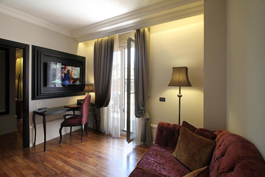 Telewizja i/lub zestaw kina domowego w obiekcie Hotel Milano & SPA***S