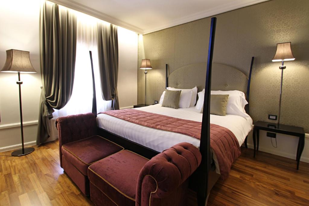 Łóżko lub łóżka w pokoju w obiekcie Hotel Milano & SPA***S