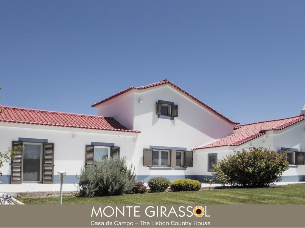 a white house with red roof at Monte Girassol - The Lisbon Country House! in Quinta das Faias