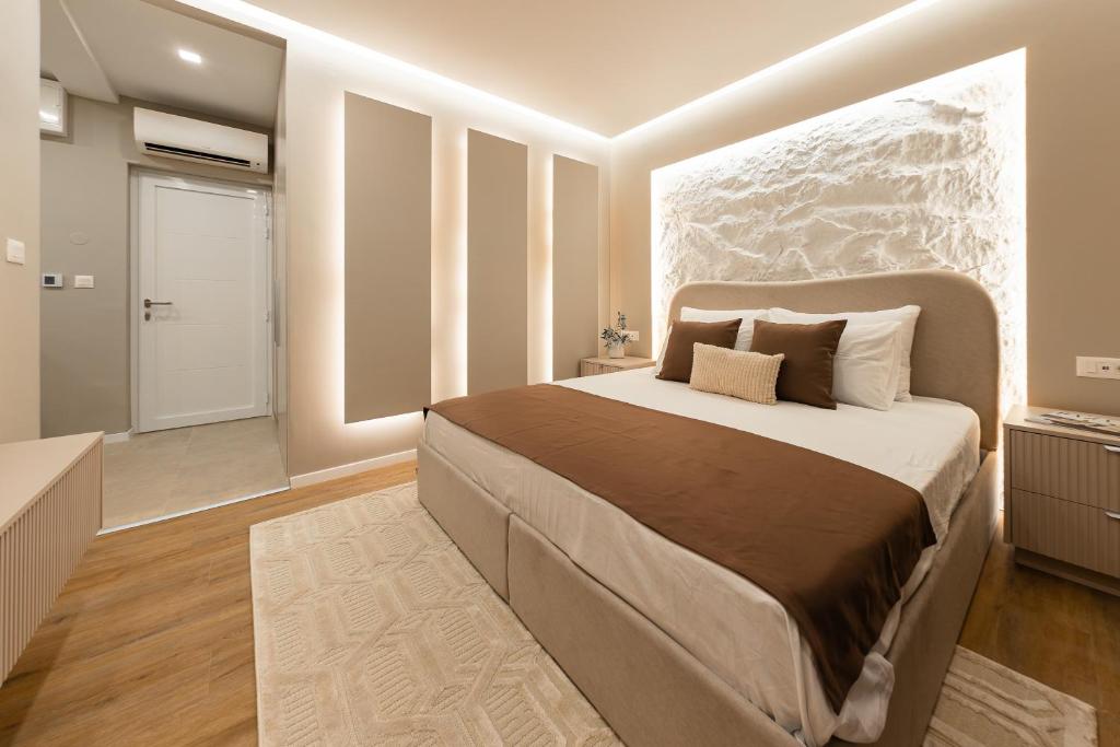 a bedroom with a large bed in a room at Armal Studio in Mostar