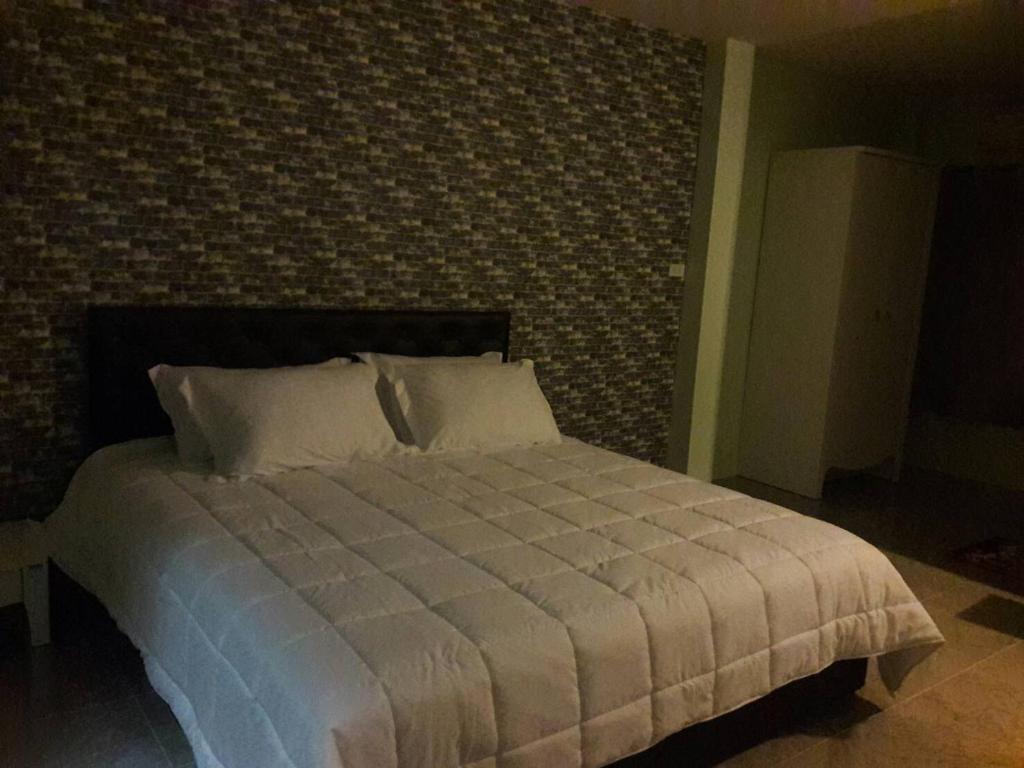 Кровать или кровати в номере Pingpong 's house Koh chang