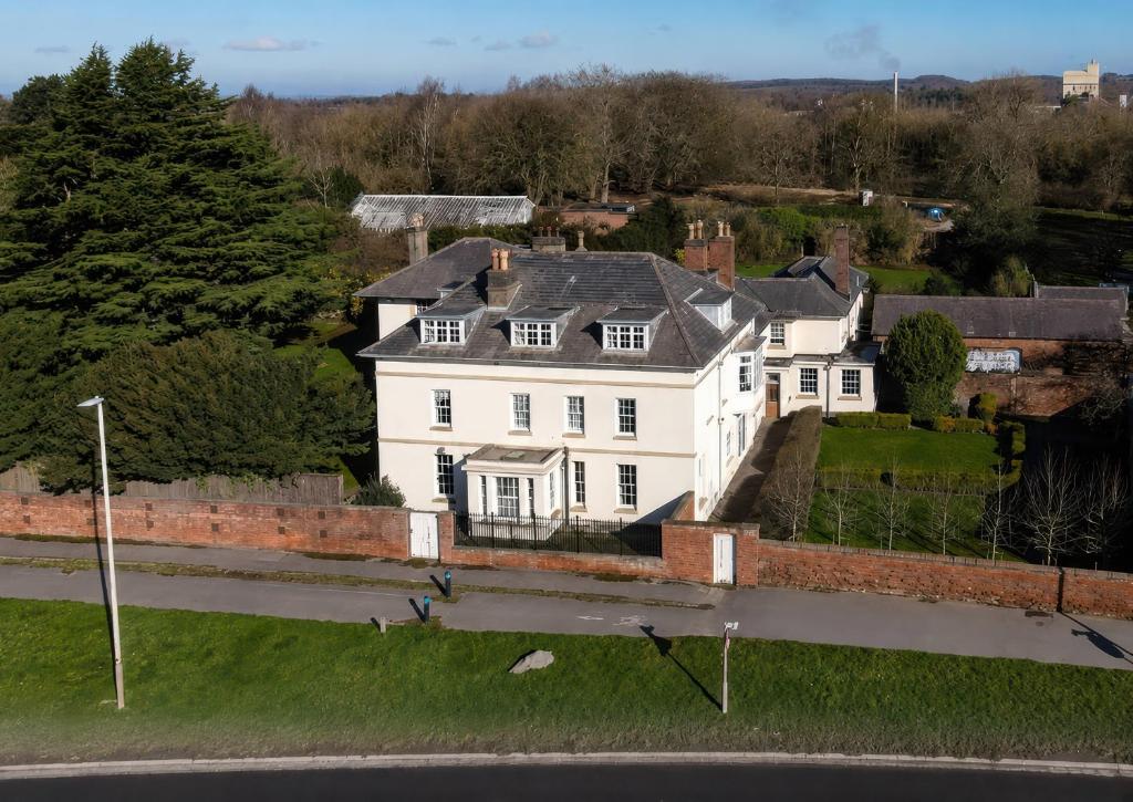 a large white house on the side of a road at Bardon Hill Manor in Coalville