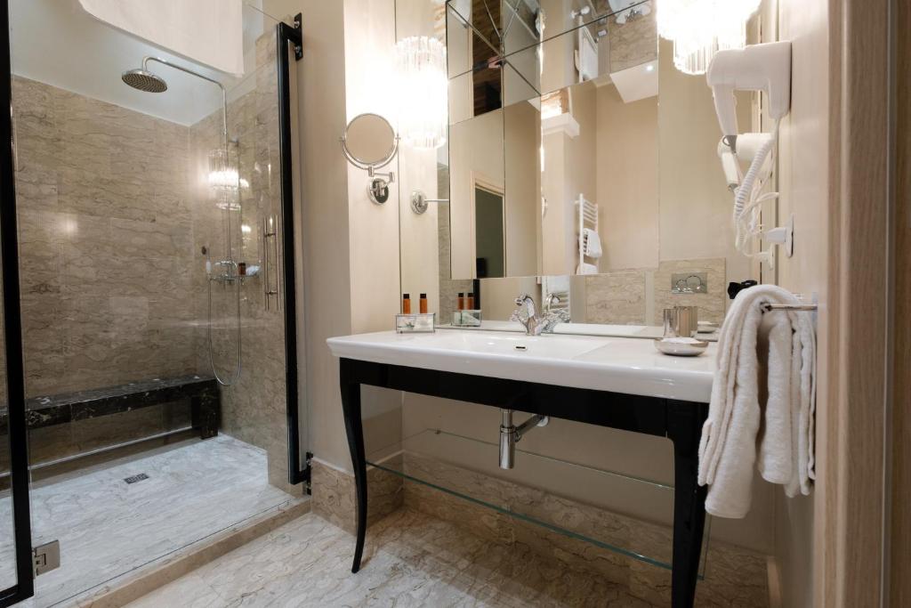 Kúpeľňa v ubytovaní Apart Hotel Torino