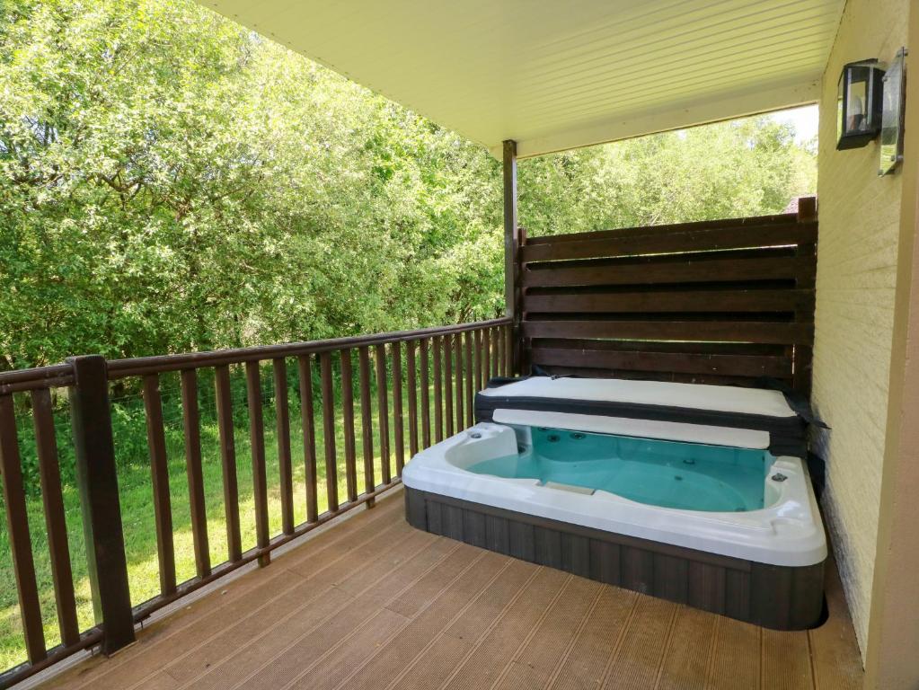 a hot tub on the deck of a house at 7 Brunston Avenue in Girvan