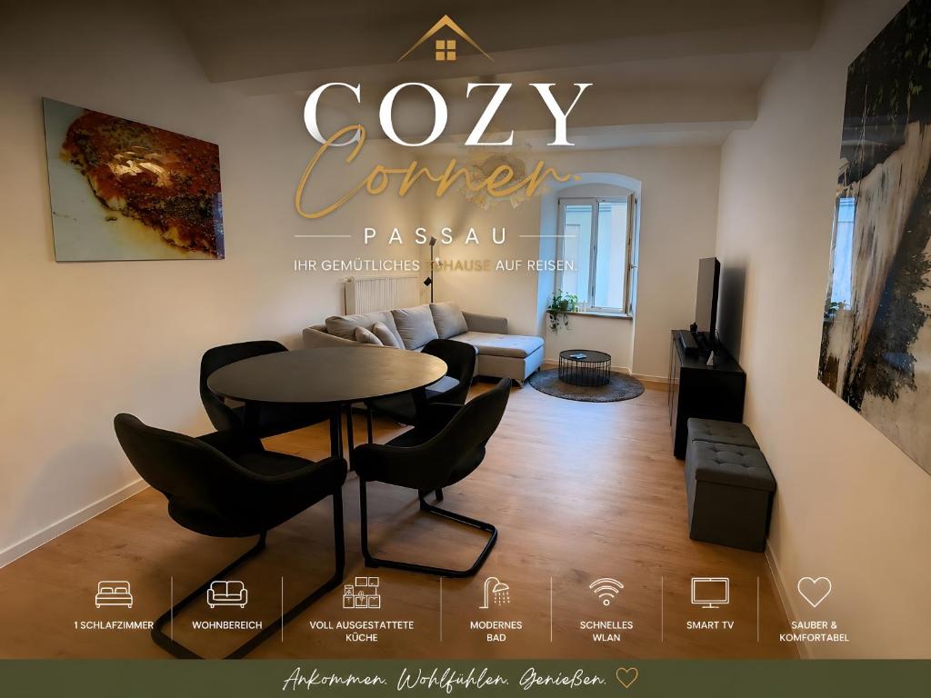 a living room with a couch and a table at Cozy Corner - Passau in Passau