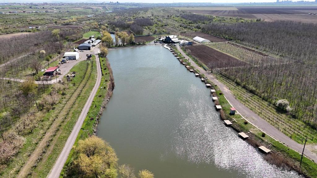 an aerial view of a river with boats in it at Ferma DAC in Galaţi