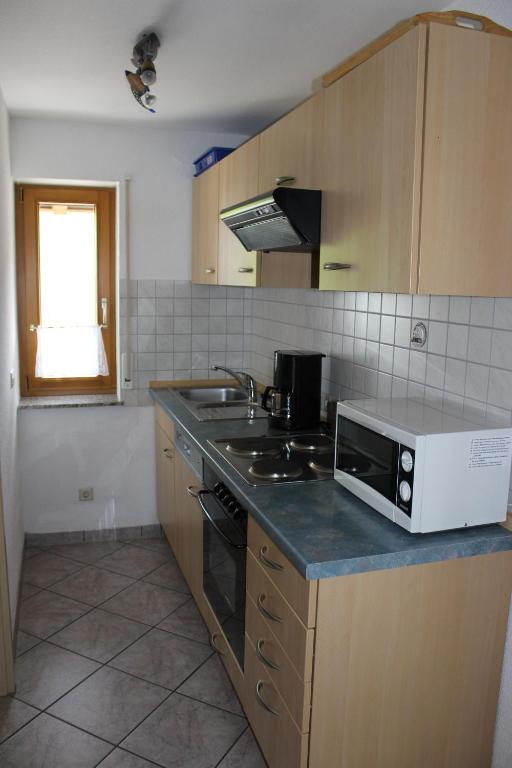 Kuchyň nebo kuchyňský kout v ubytování Ferienparadies Hugenhof