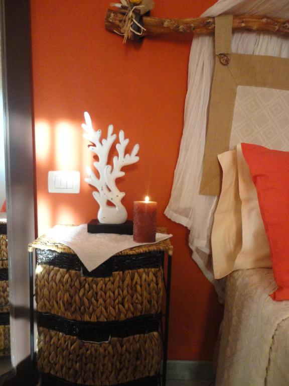 A bed or beds in a room at B&B Mare E Natura