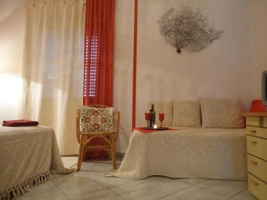 A bed or beds in a room at B&B Mare E Natura