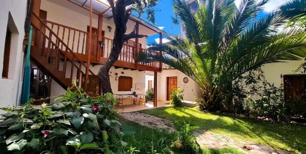 a view of the house from the garden at The Green Corner Urubamba in Urubamba